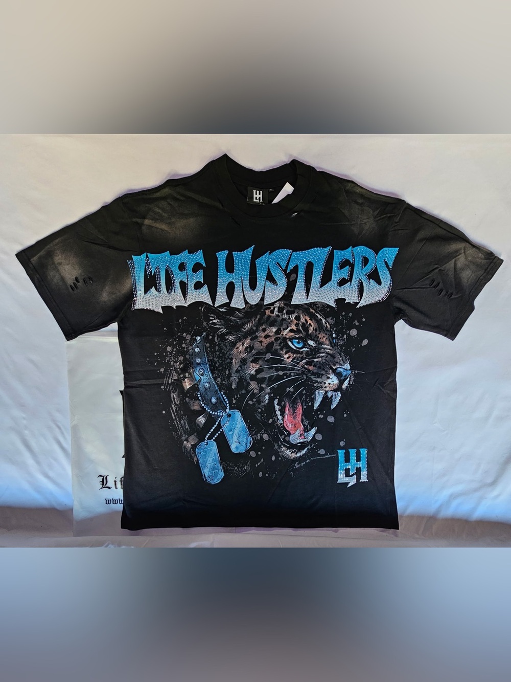 Life Hustler Hollywood Black Graphic Tee with Blue Leopard Design
